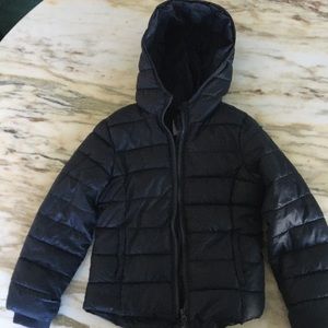 Gray child’s puffer jacket